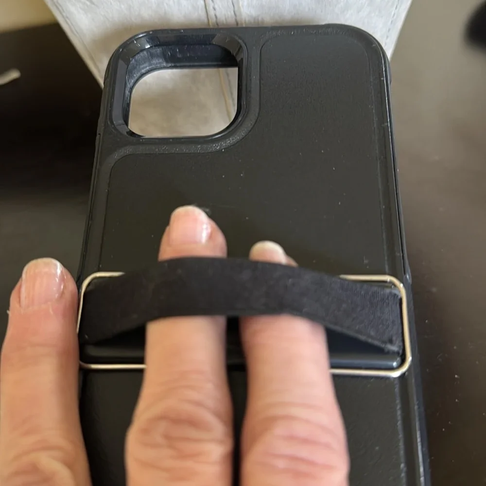 iPhone 13 hardshell case with stand and elastic strap on back